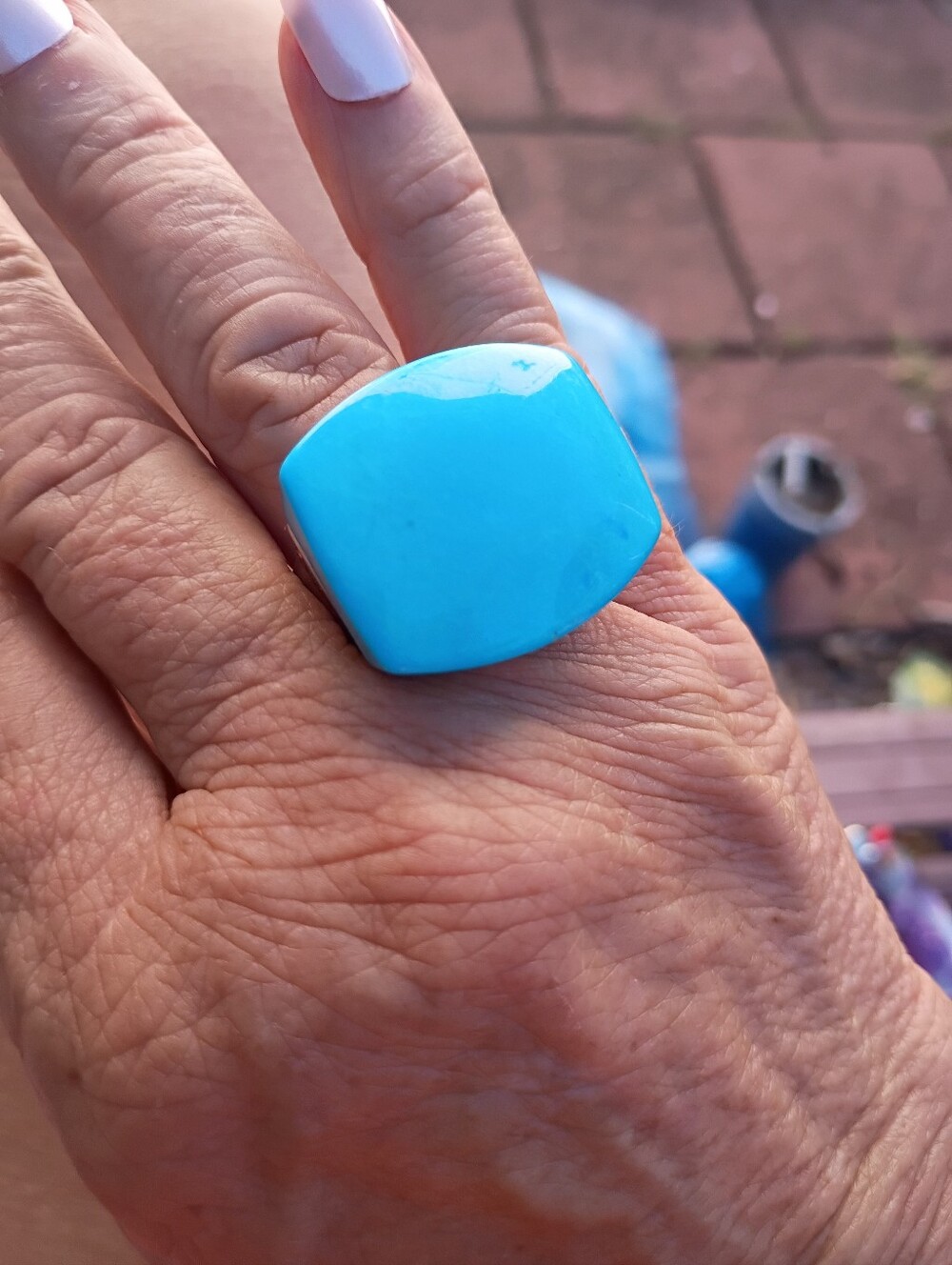 .925 Substantial thick walled mixed turquoise ring,